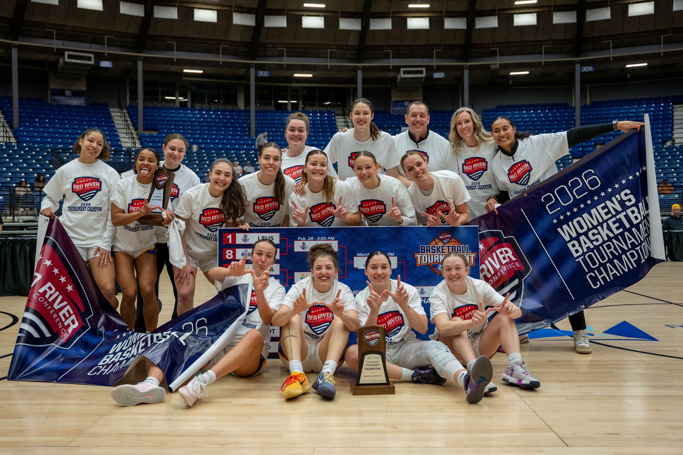 Head Coach Tim Hays and the LSUS Pilots celebrate their regular-season and tournament championships. Photo courtesy of LSUA Media.